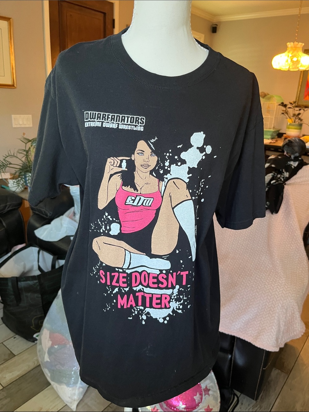 Black Graphic Tee with Pink Accent and 'Size Doesn't Matter' Slogan